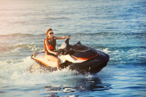 woman-jet-boating-sea-min-675x450
